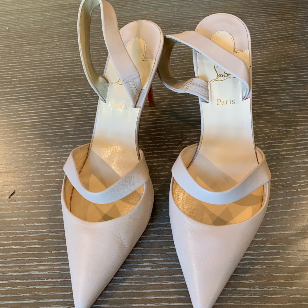 Christian Louboutin beige sling pump.